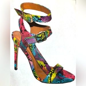 X2B Multi-color snake skin heels. Brand new in original packaging. Sizes 5.5-10